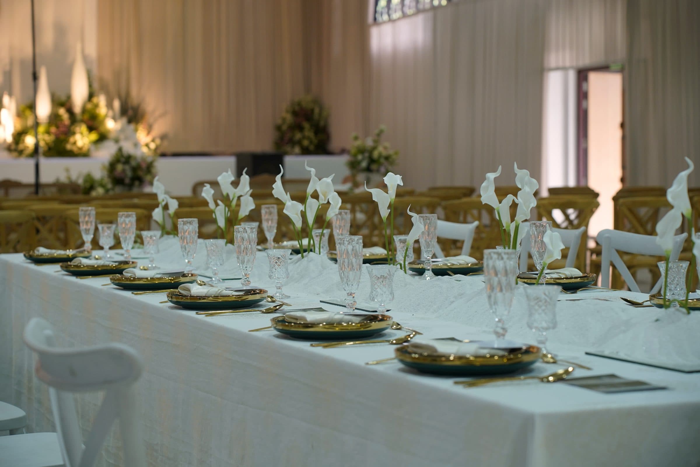 Calla lilies on a dining table, close