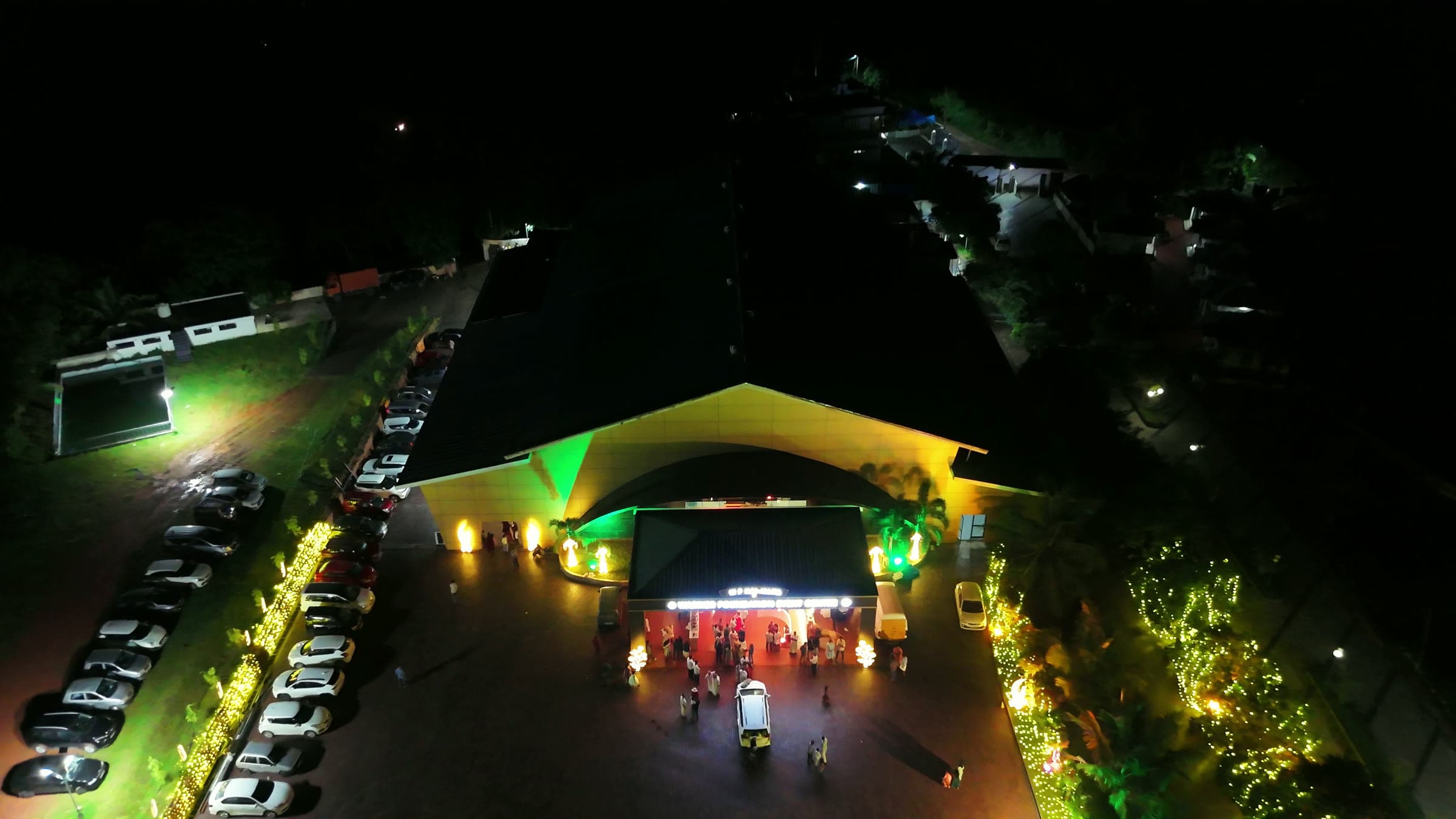 The venue illuminated after dark, seen from above
