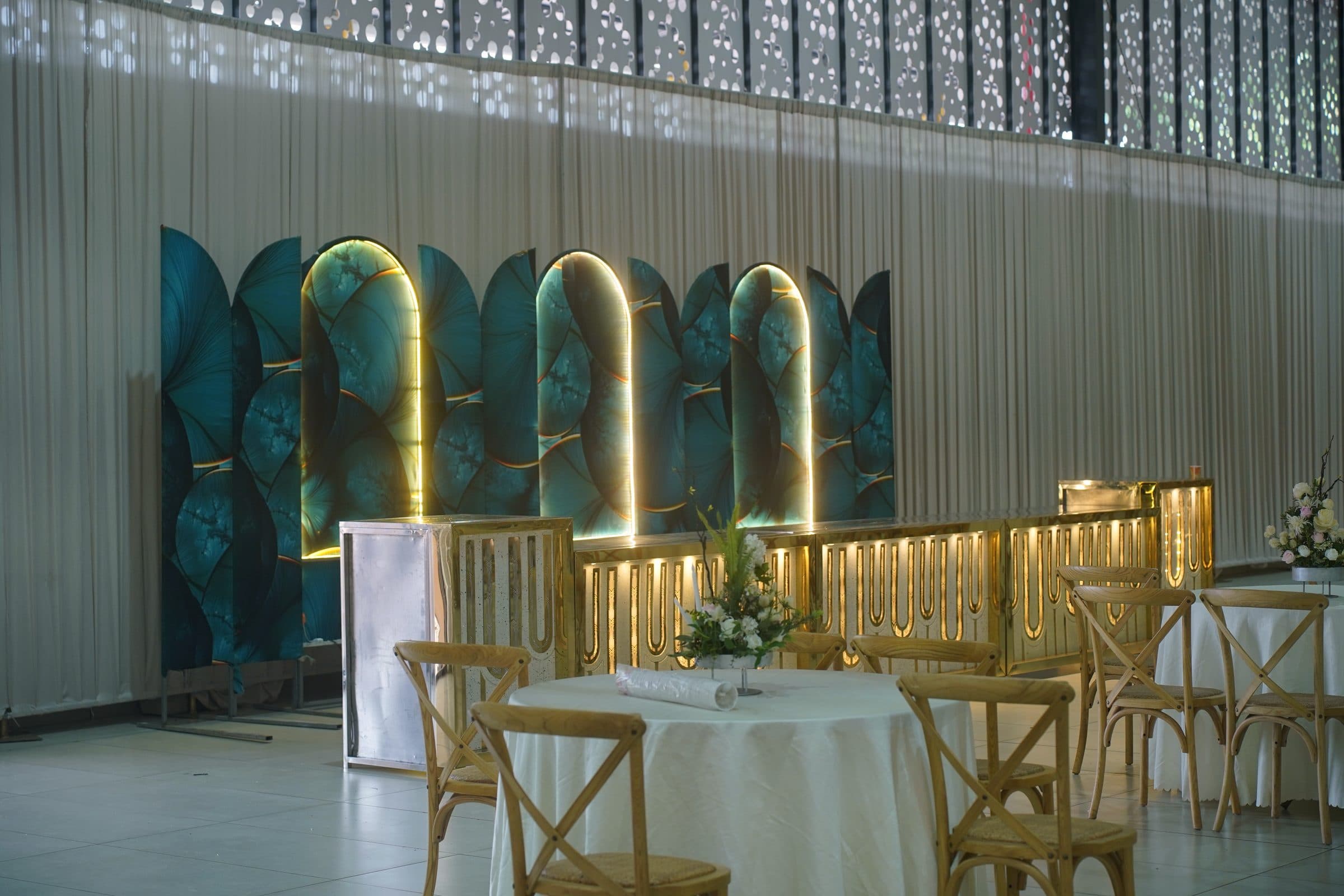 The reception dressed beneath a run of tall arches
